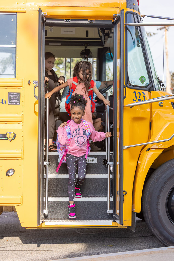 students arriving at Ivan Green