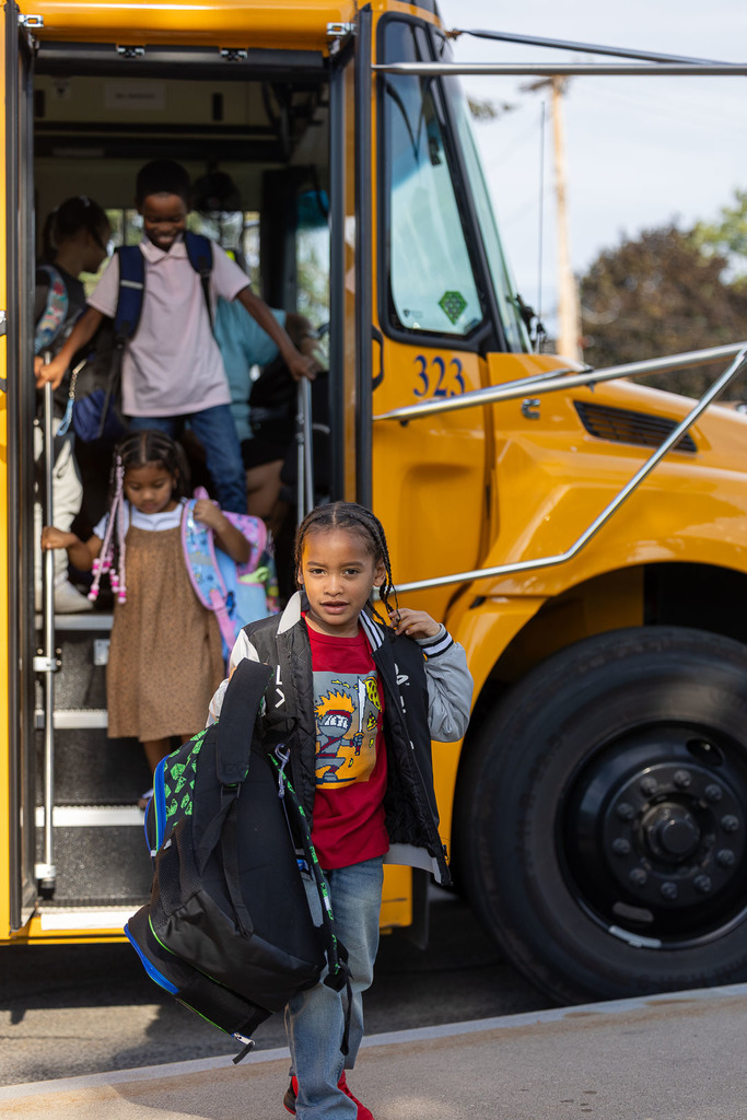 students arriving at Ivan Green