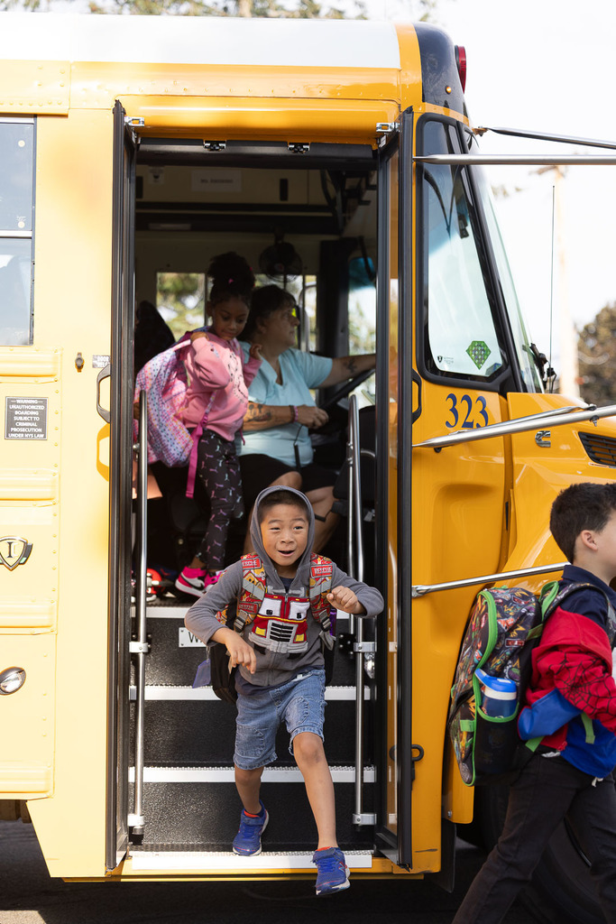 students arriving for the first day of school