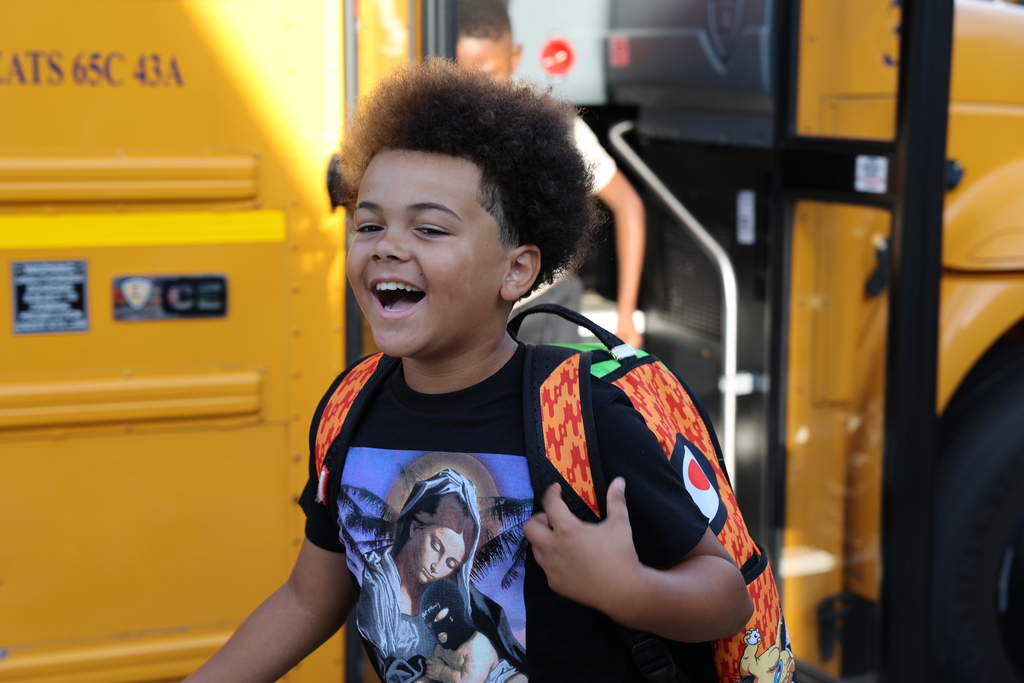 students arriving for the first day of school