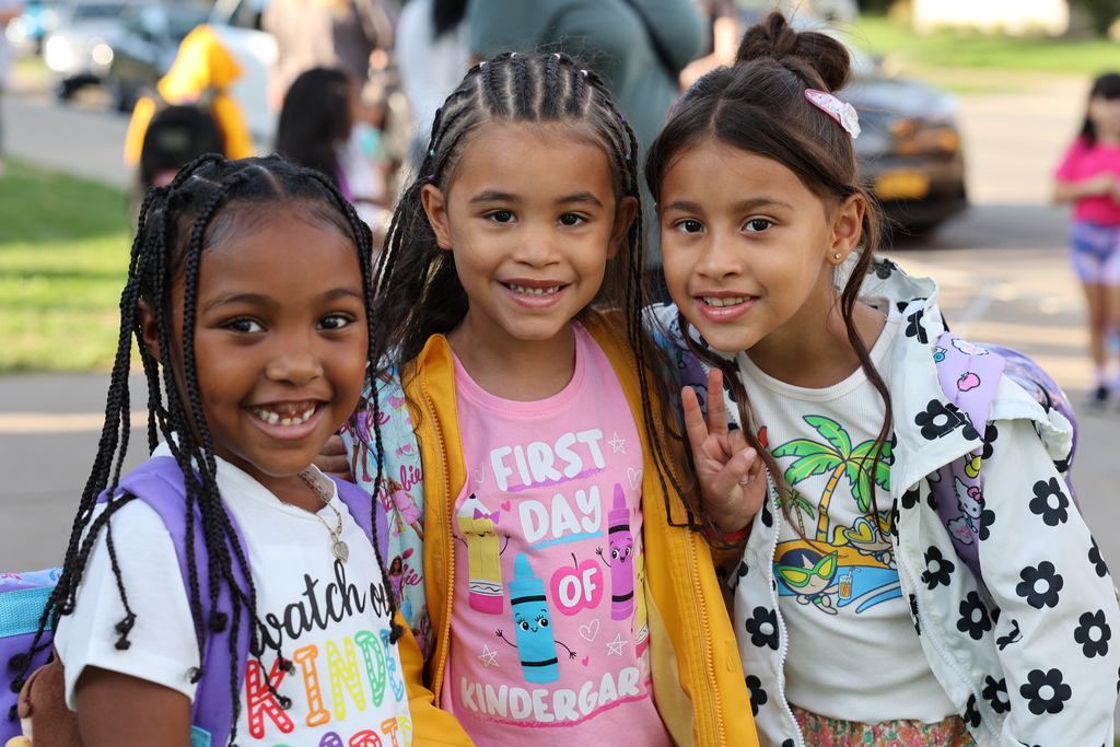 students arriving for the first day of school