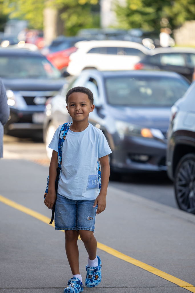 students arriving for the first day of school