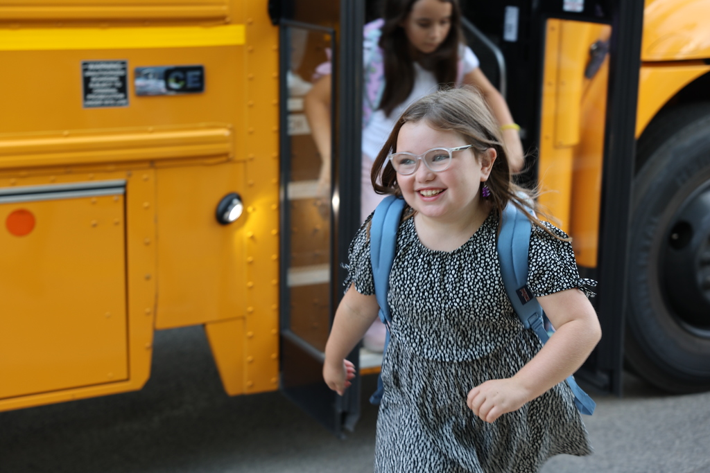 students arriving for the first day of school