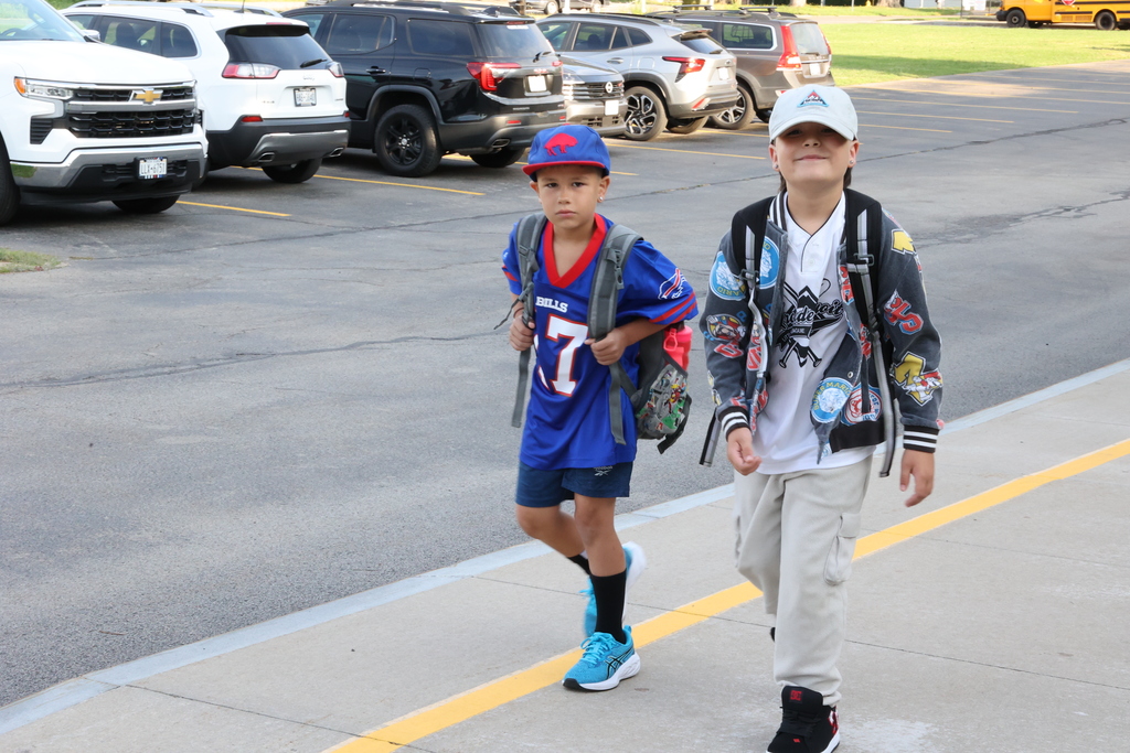 Students walk into school for the first day
