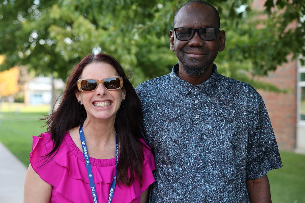 staff members smile on the first day of school