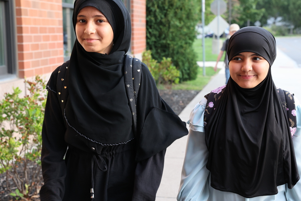 students walk into the middle school 