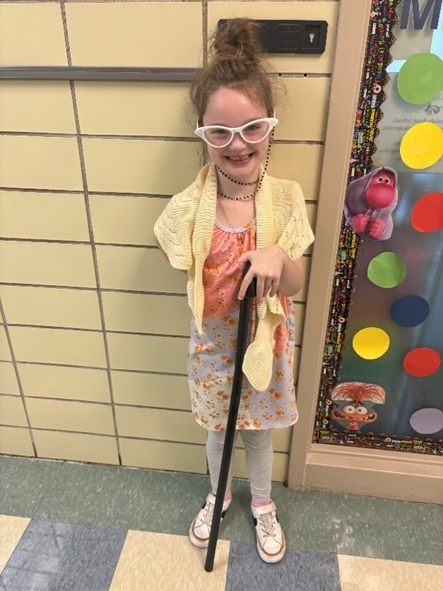 Students dressed as toddlers and elderly