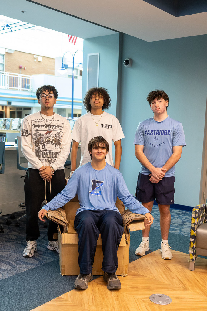 students with their cardboard chairs