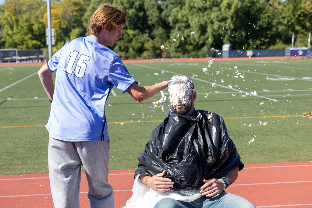 students participating in homecoming pep rally
