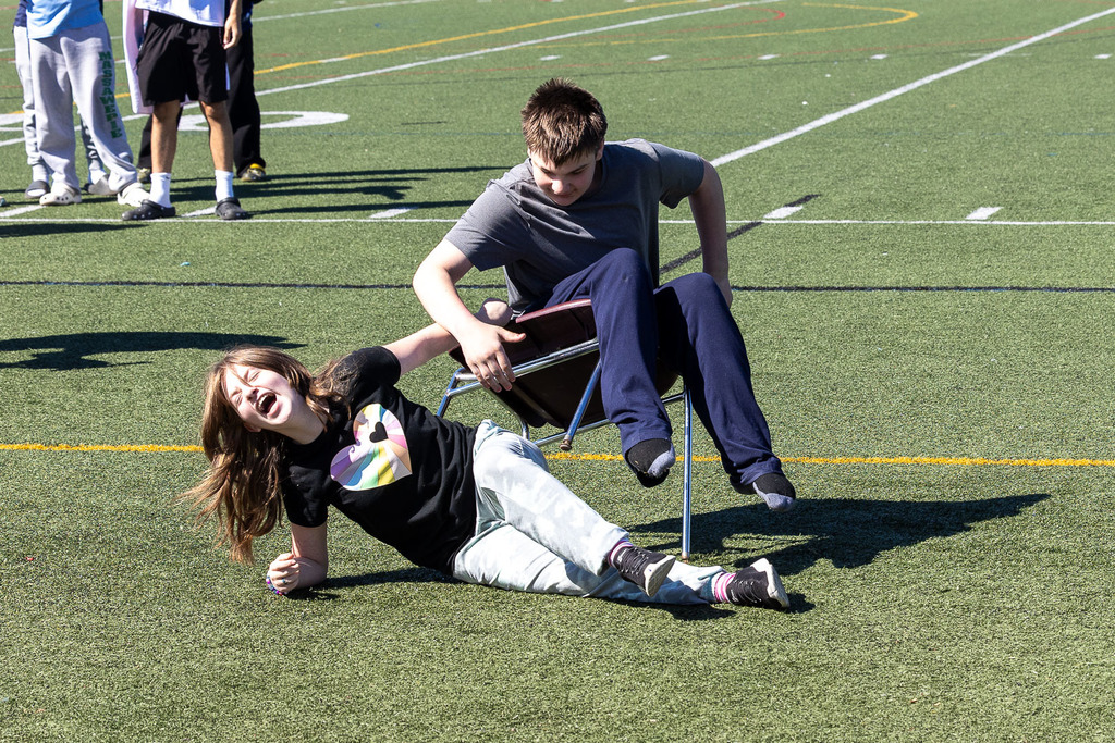 students participating in homecoming pep rally
