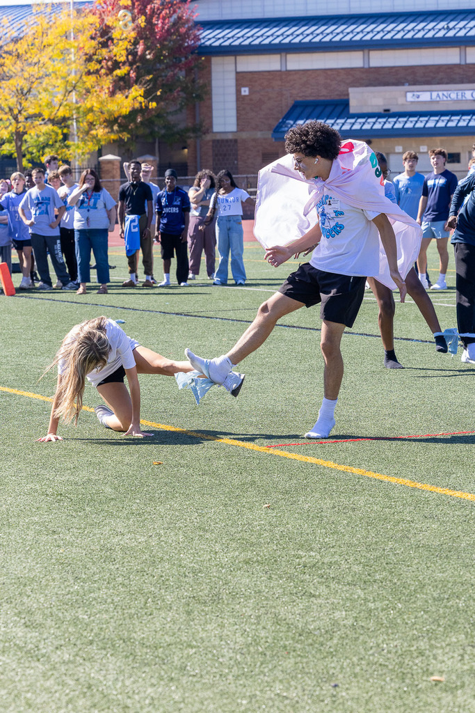 students participating in homecoming pep rally