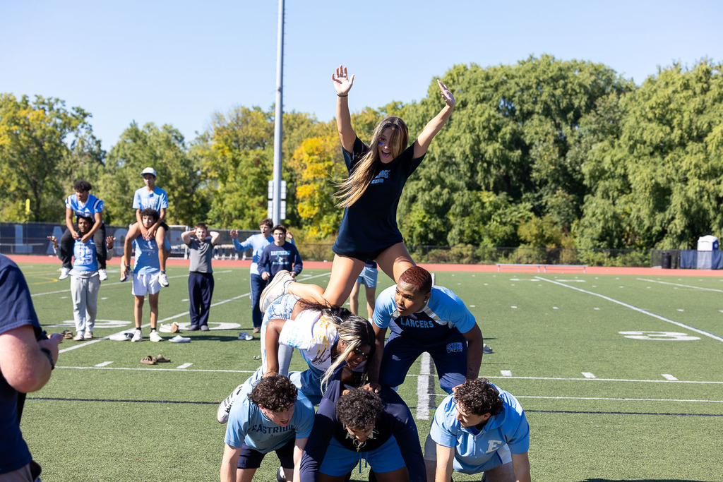 students participating in homecoming pep rally