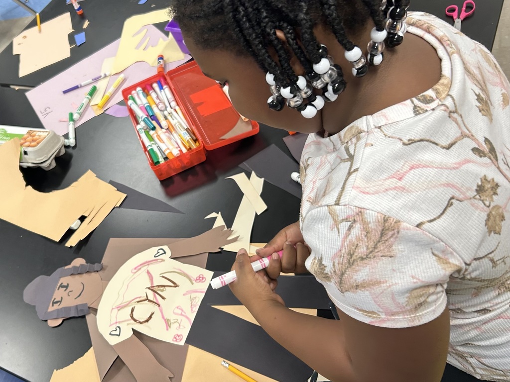 Student creates self portrait of herself