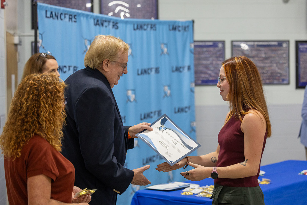 tenured teacher with board of education members