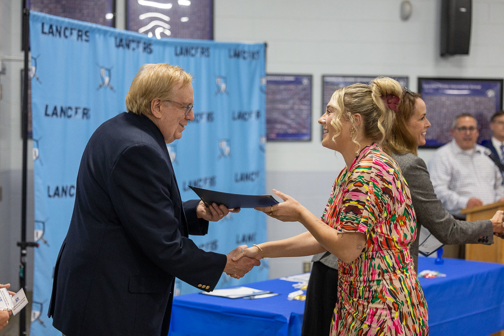 tenured teacher with board of education members