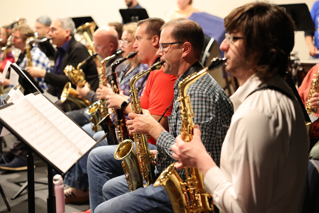 group of sax musicians play