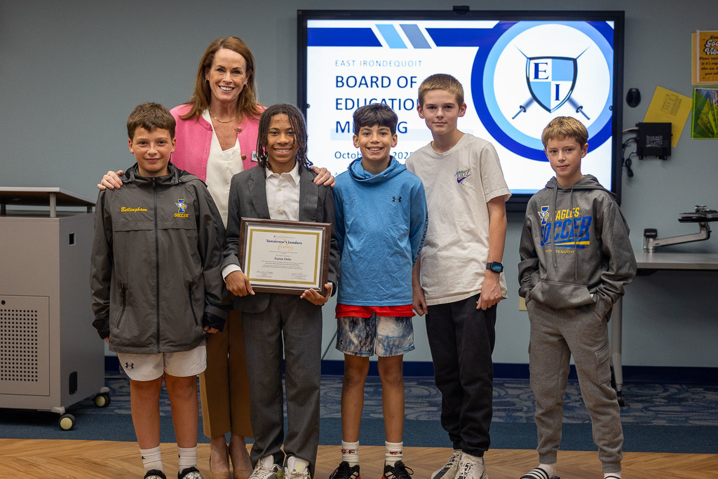 Esaias and teammates and Superintendent Grow