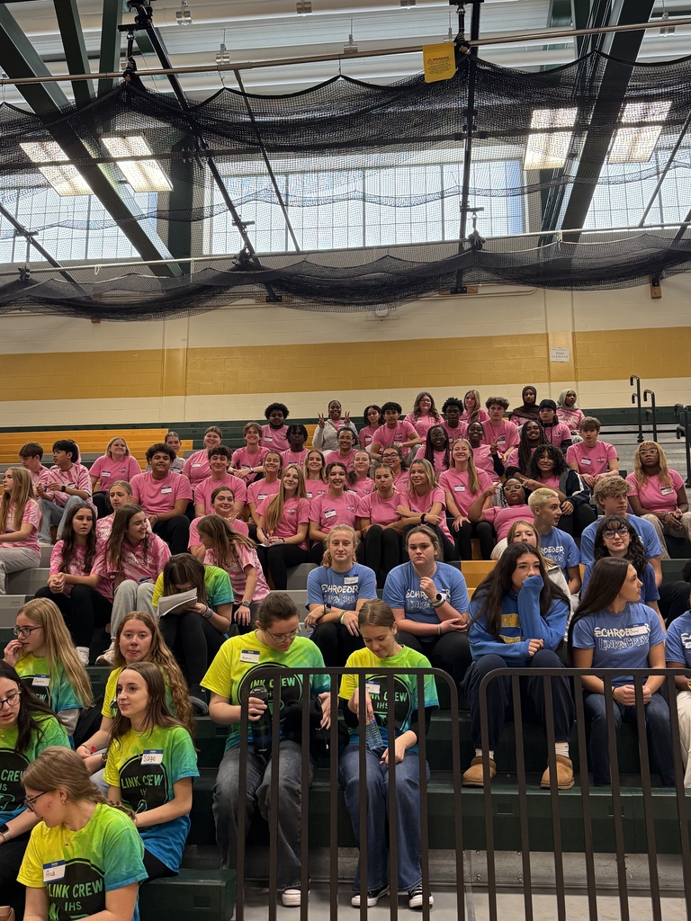 link crew leaders smile in the bleachers
