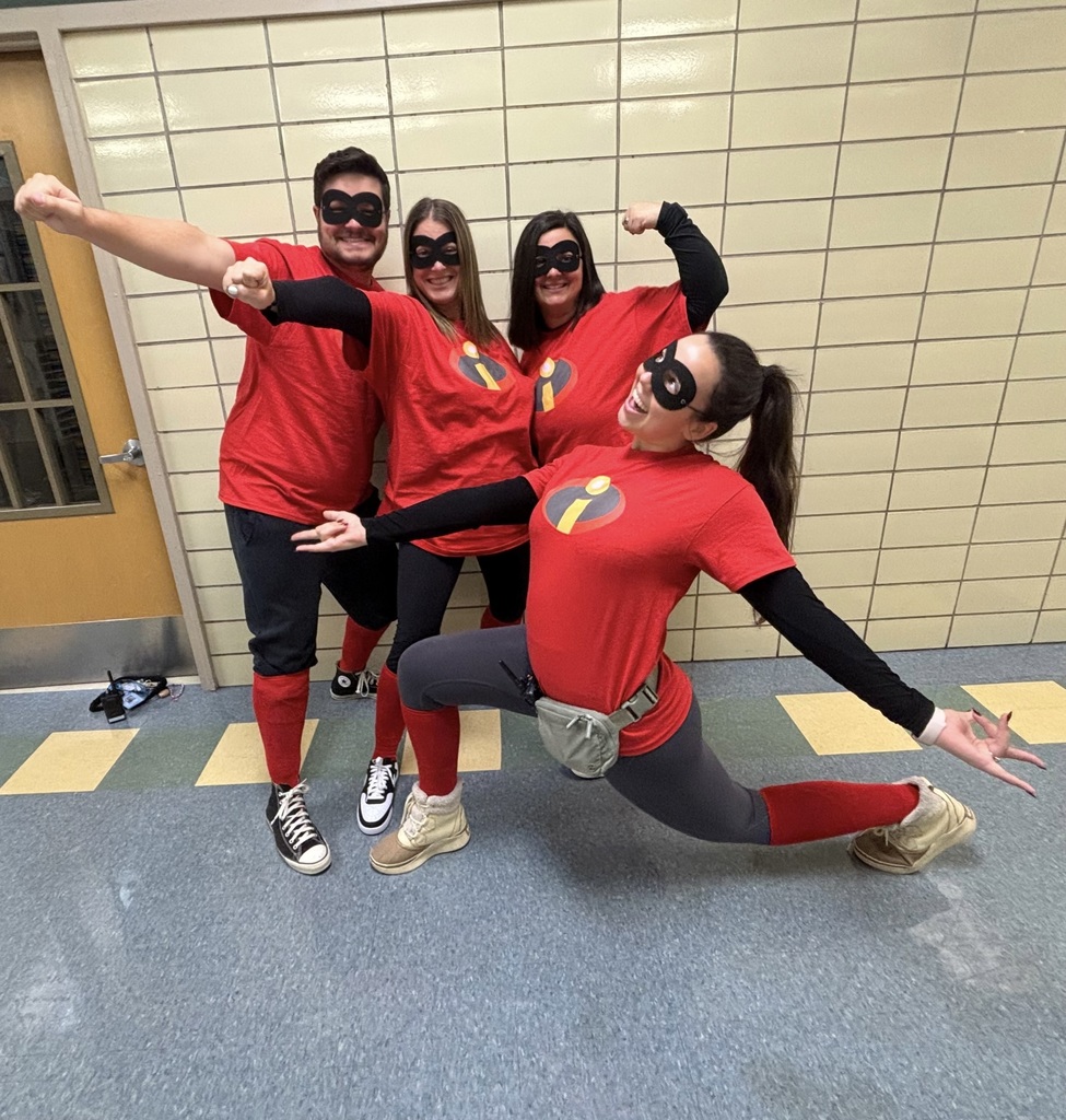 teachers pose in Incredibles outfits