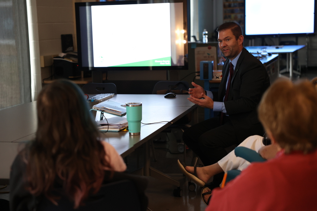 County Legislator David Long speaks to a student during a presentation
