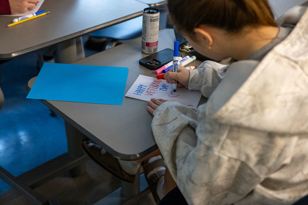 Students making Veterans Day cards