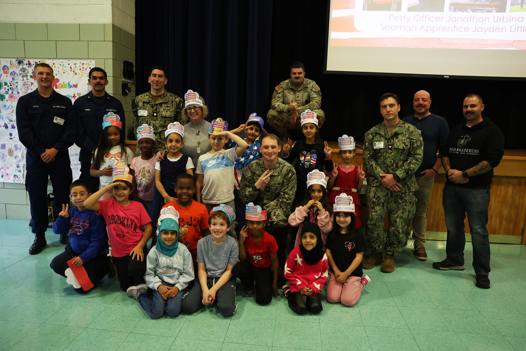 students pose with visiting military branches 