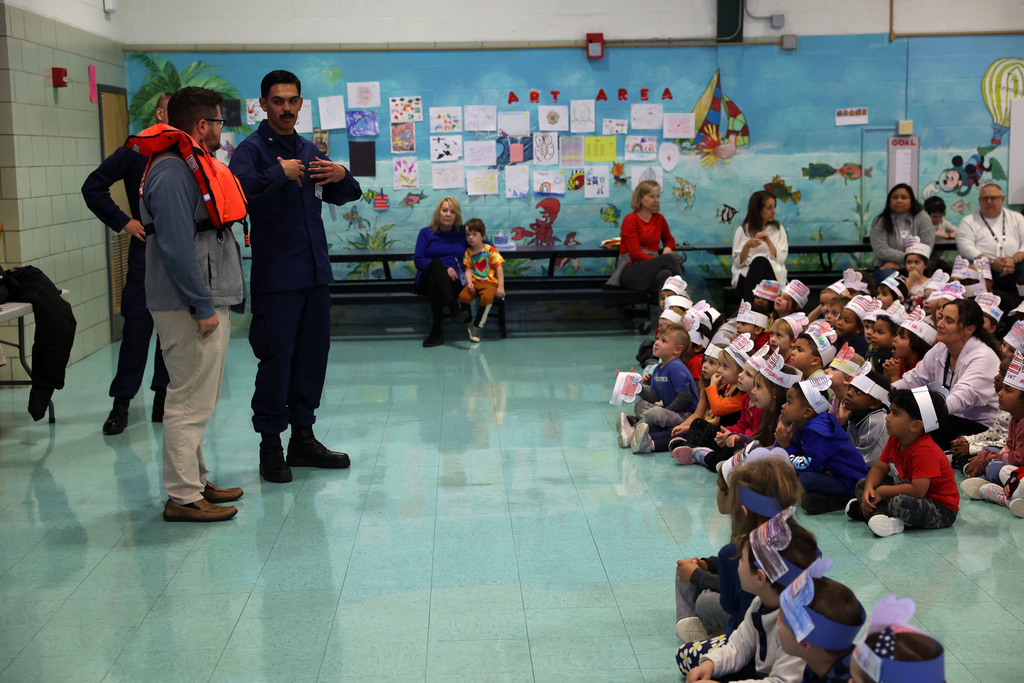 students learn from the coast guard