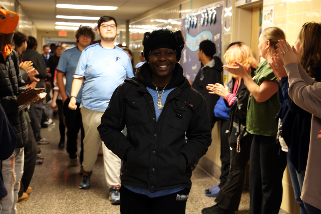 bowling member smiles in the hallway