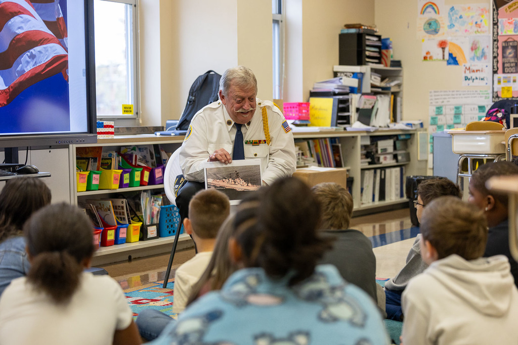 Navy Veteran speaking to the class about his time in the Navy