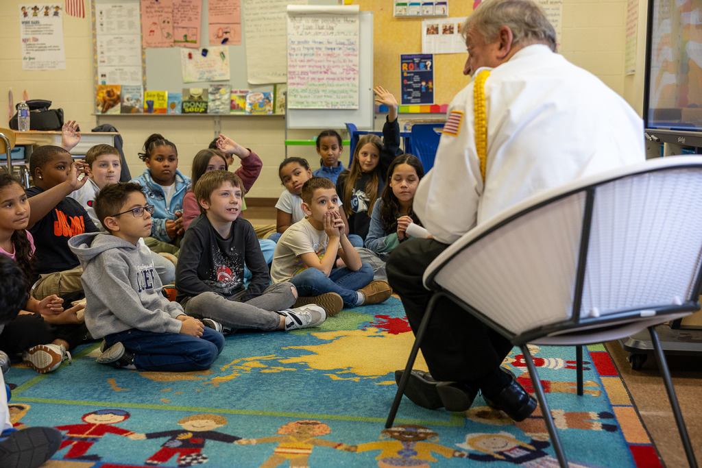 Navy Veteran speaking to the class about his time in the Navy