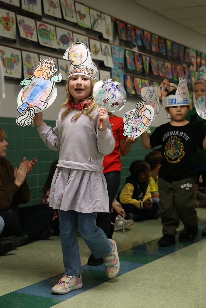students smile during school parade 