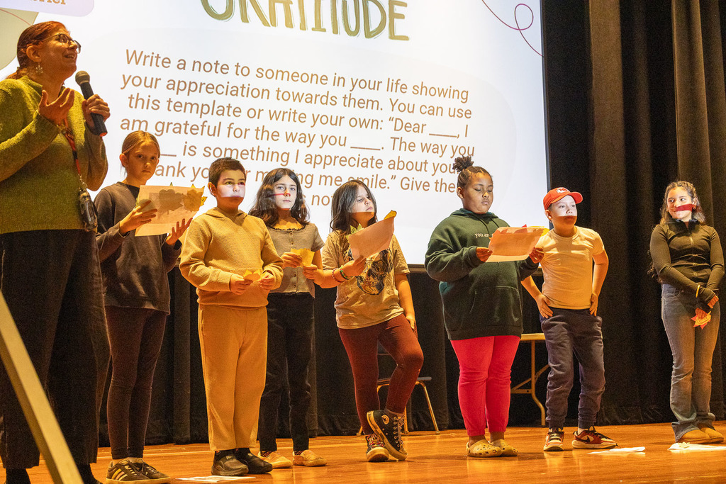 students reading messages of gratitude