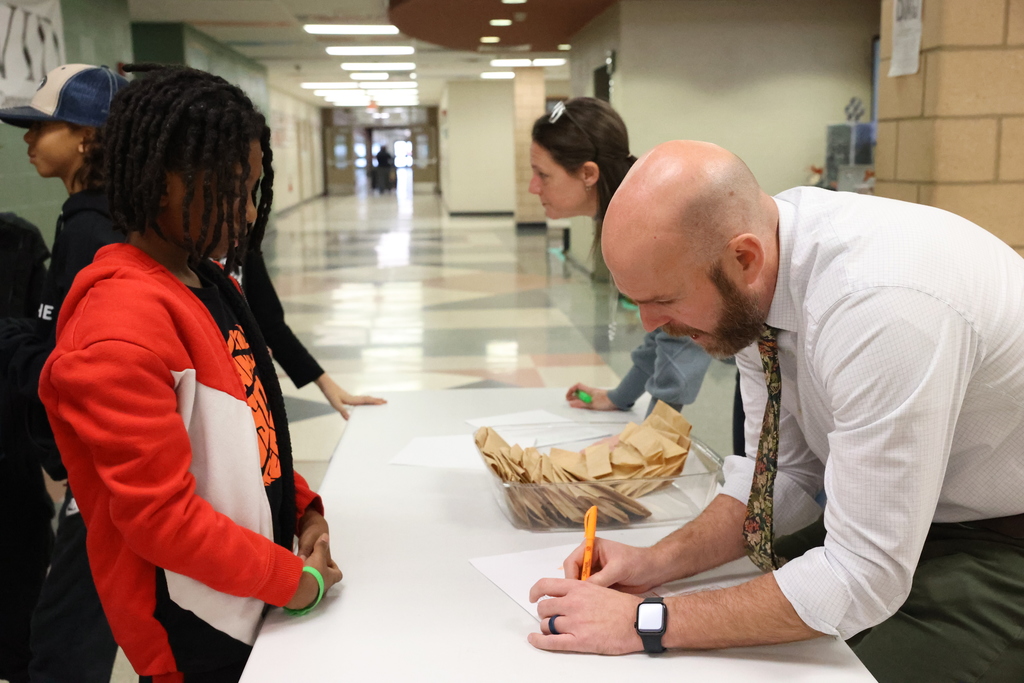 Students ask faculty if their name is on the high honor roll