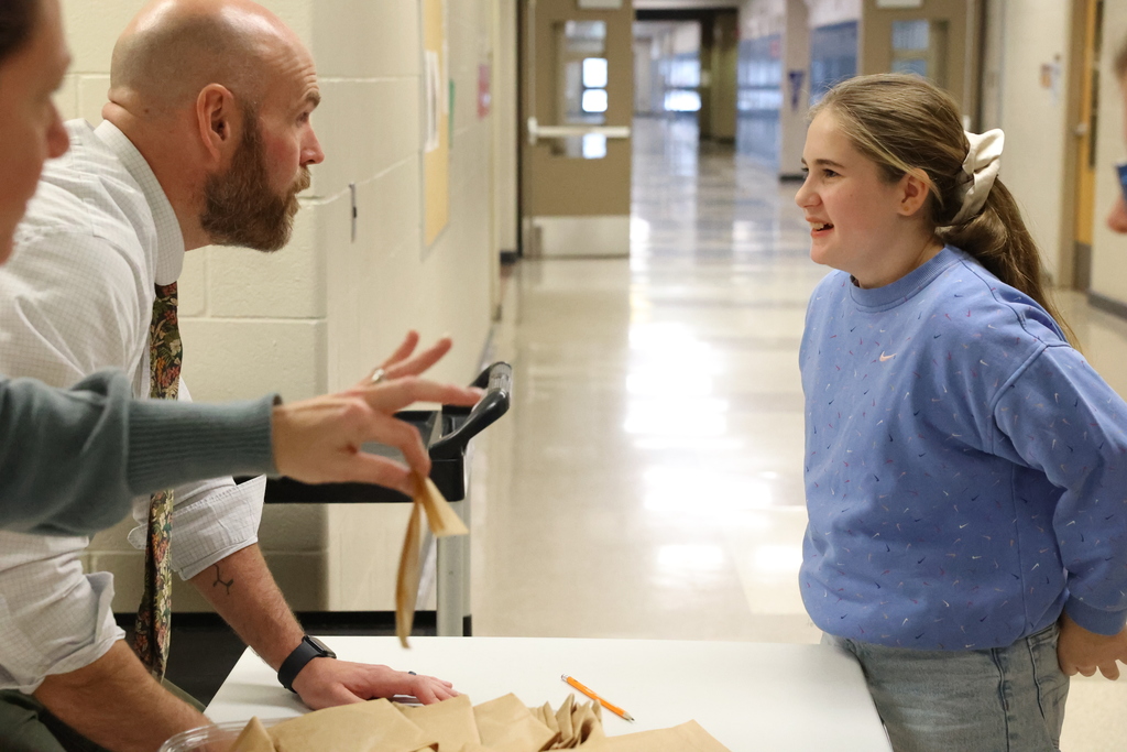 Students ask faculty if their name is on the high honor roll