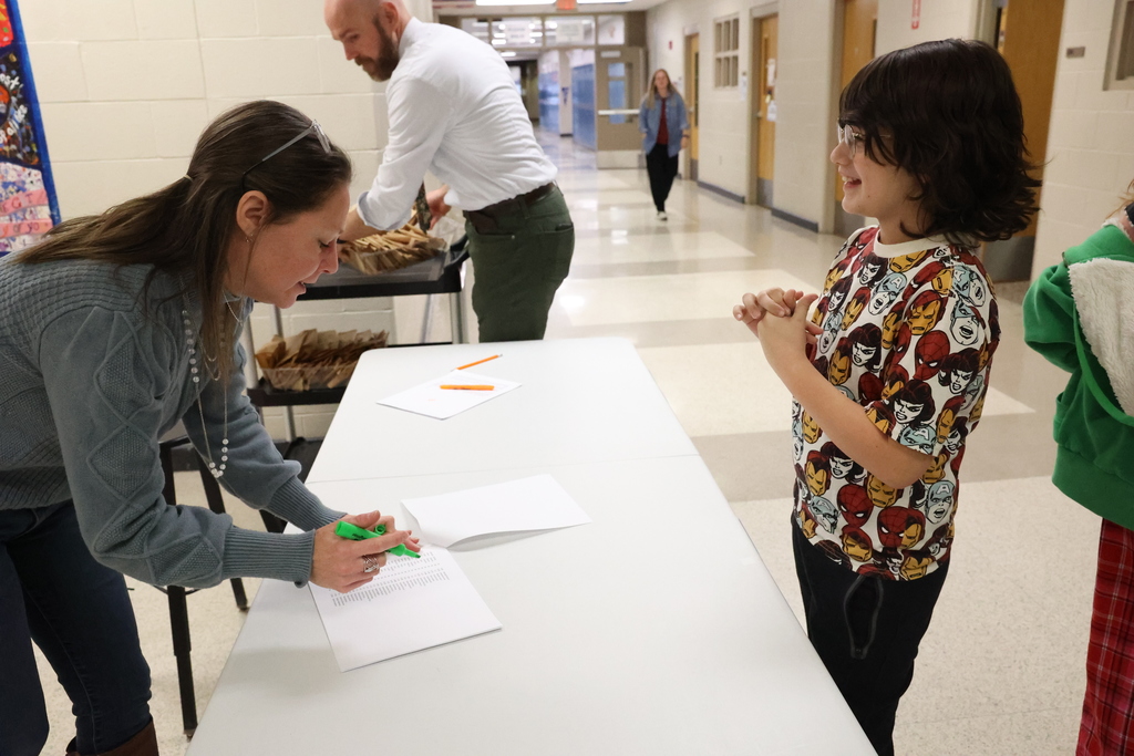 Students ask faculty if their name is on the high honor roll