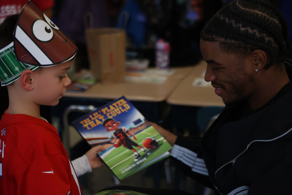 student gets book signed