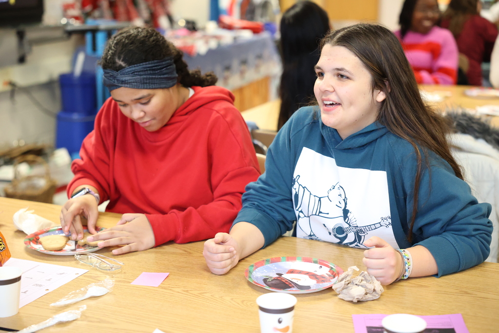 student laughs while doing winter activity