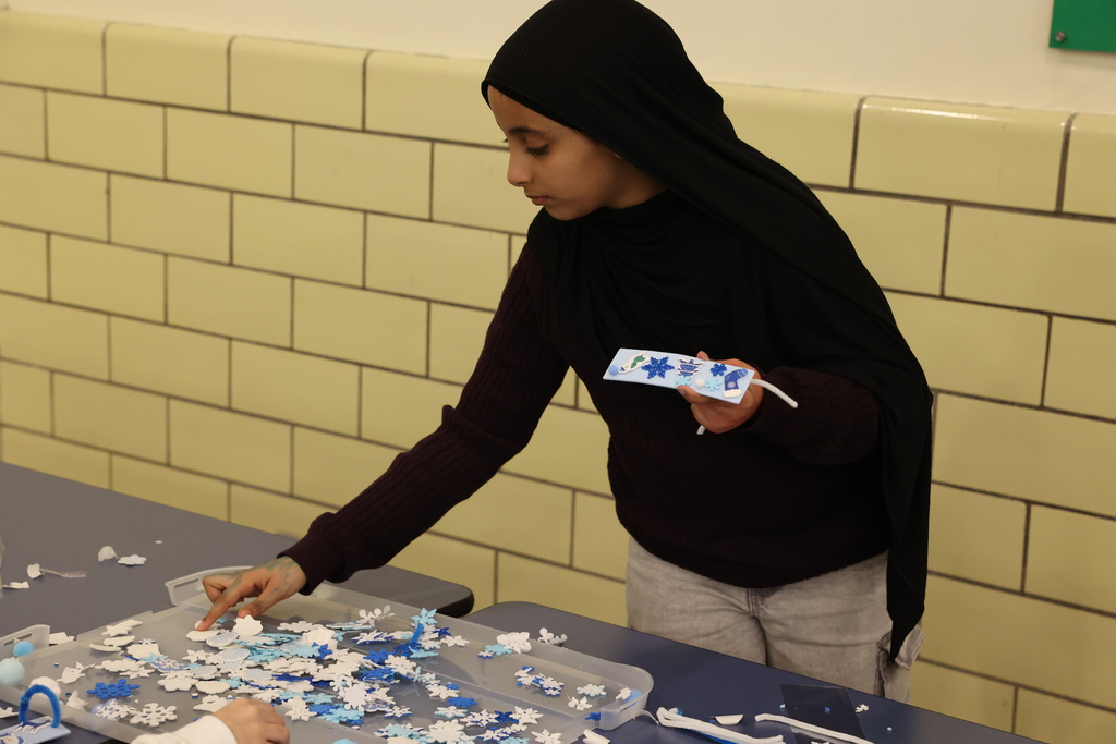 Student works on book mark craft