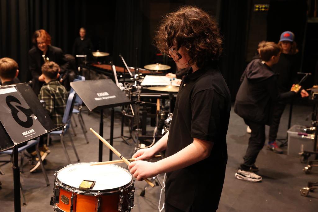 Student plays the drums 