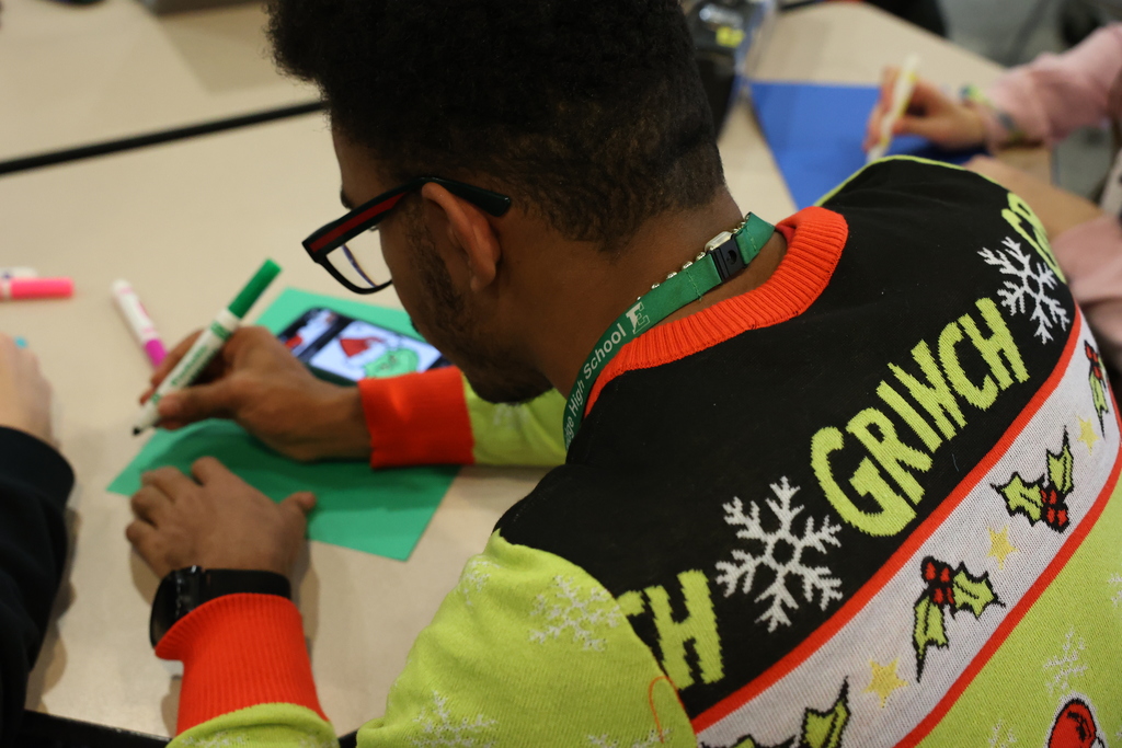 Student draws the grinch on holiday card