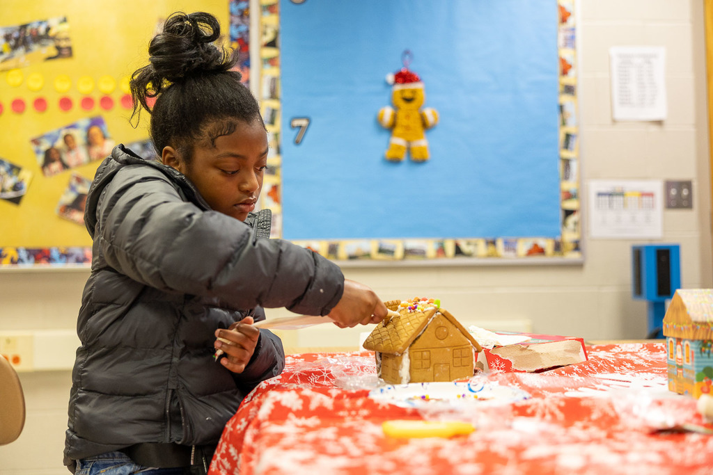 students making gingerbread houses