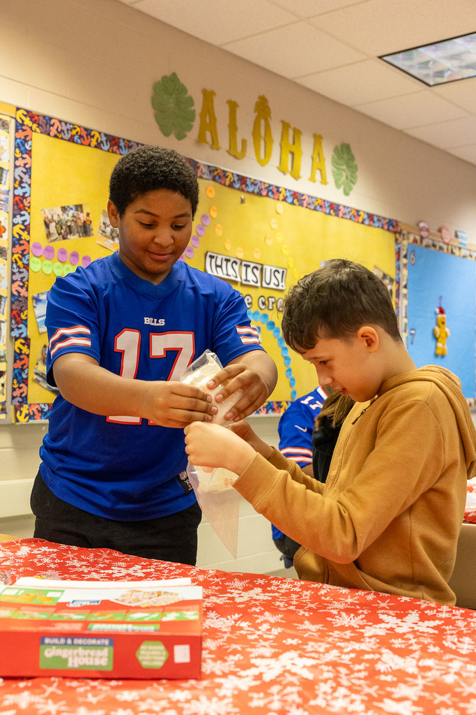 students making gingerbread houses