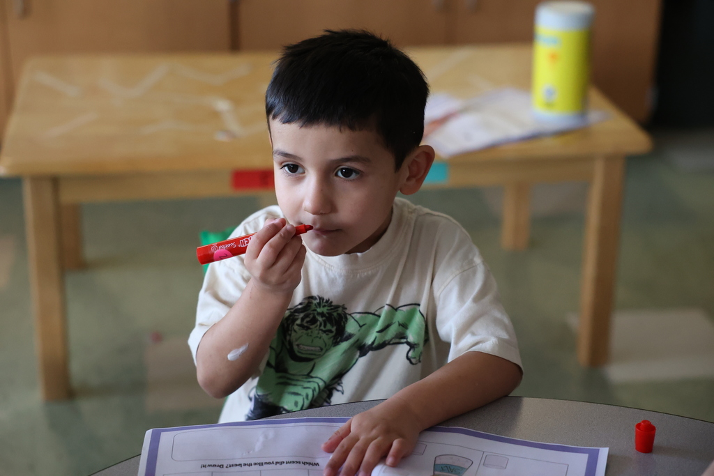 student smells marker