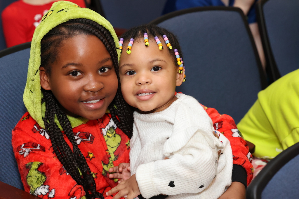 student and sister smile 