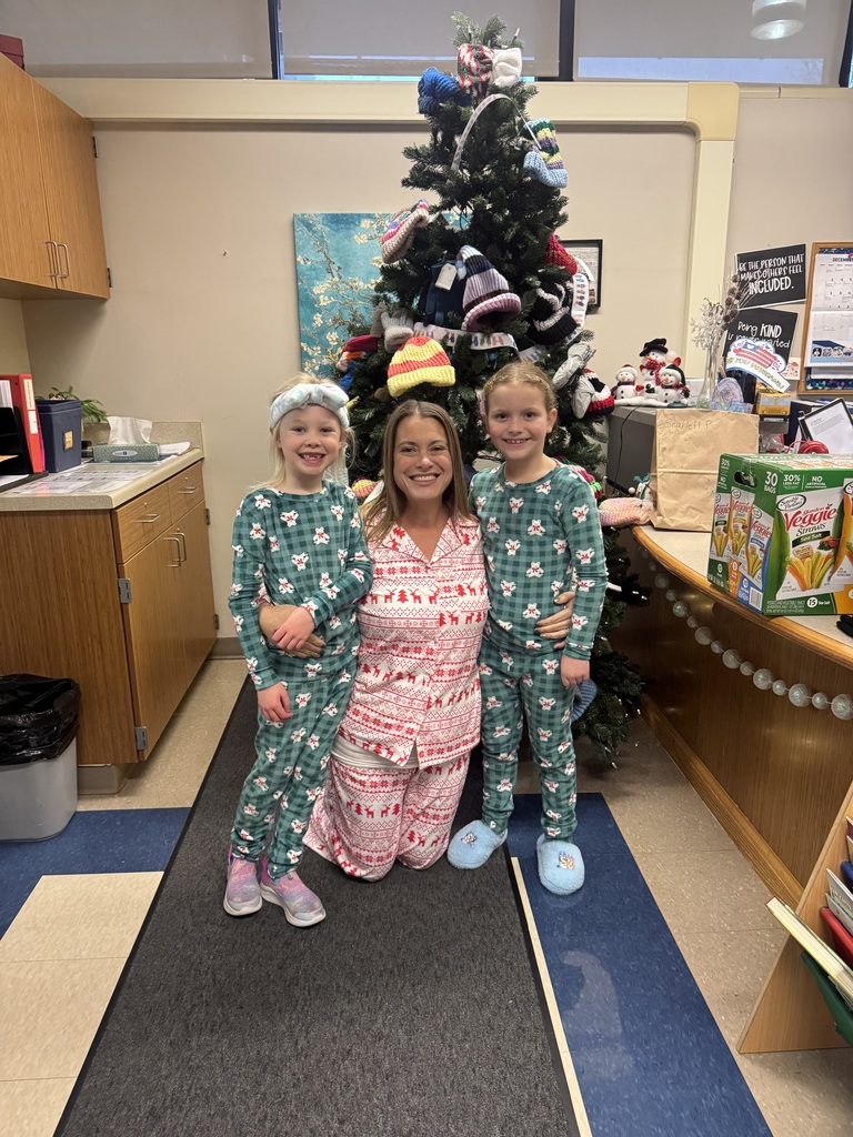 Student pose with principal