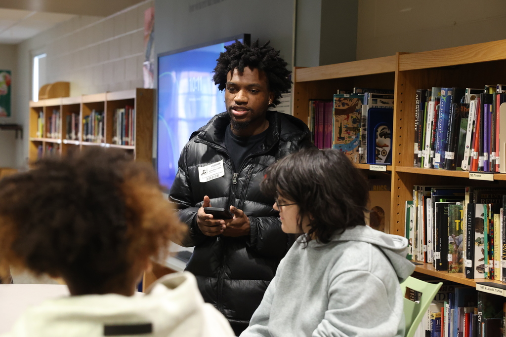 college students talks about college life with EIMS students