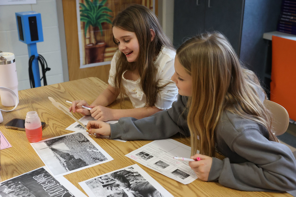 students work on club activity 