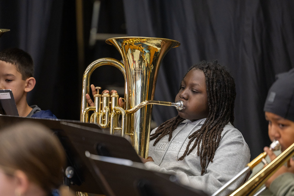 Student playing in the band