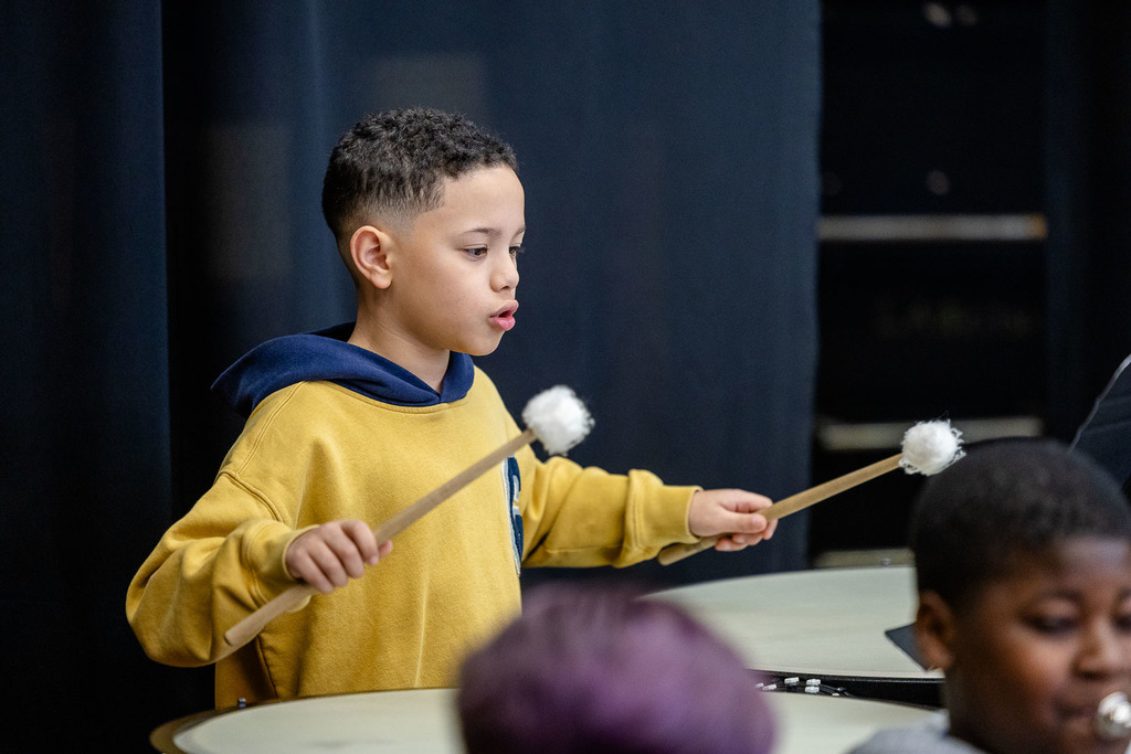 Student playing in the band