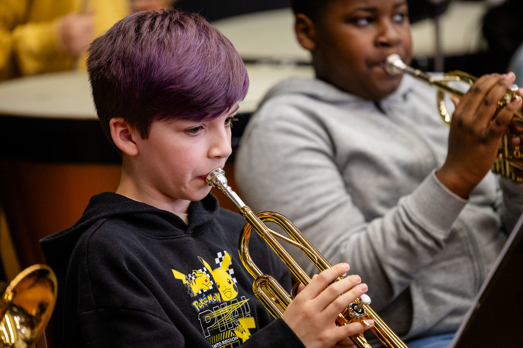 Student playing in the band
